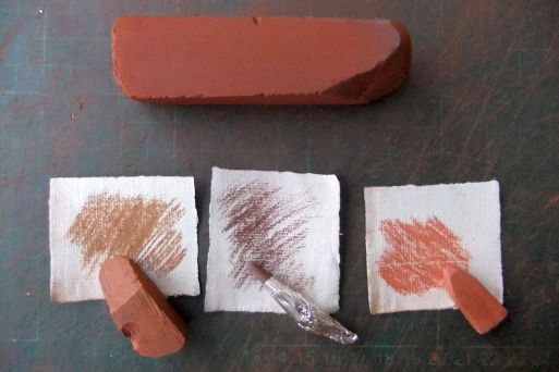 een grote staaf r&ouml;tel en extra kleuren r&ouml;telkrijt