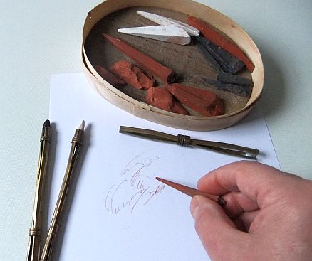 de hand als krijthouder